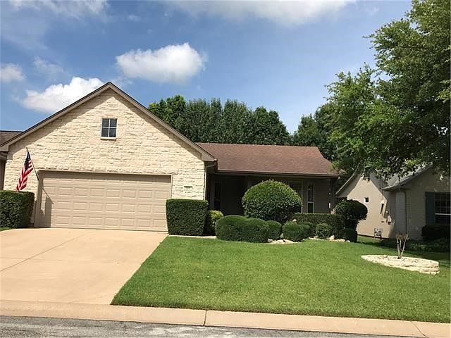 This well-maintained Cypress features an enclosed patio, extended patio with seat ledge and fenced y