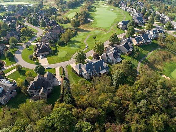 This photo, see the bottom row of homes, shows the incredible privacy behind the home which is the view from  the breakfast Nook