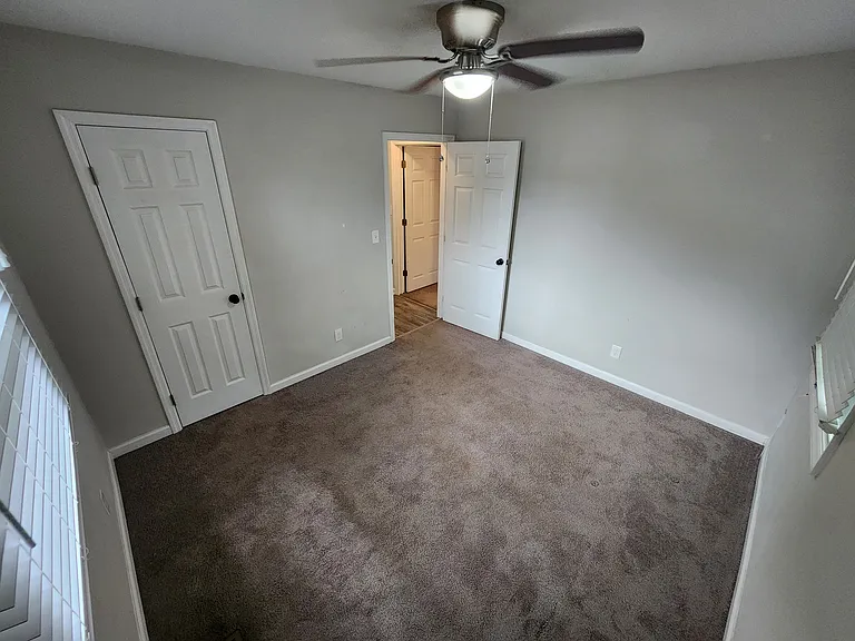 Front house - Bedroom 3 (NOTE: all bedrooms will no longer be carpeted, they will have the same laminate wood flooring as the rest of the house)
