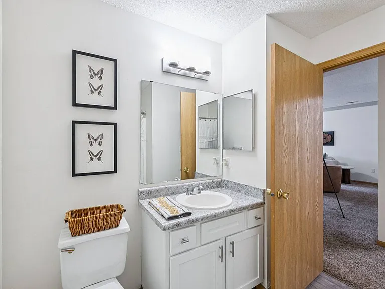 Clean finishes and ample vanity storage make daily routines feel streamlined and refreshingly simple.