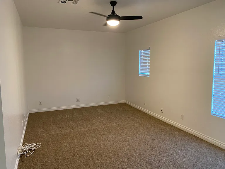 Bedroom #4 - Ceiling fan, walk-in closet, separate front entry.