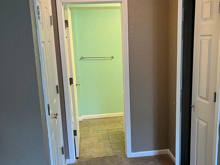 Master bath and closets on either side