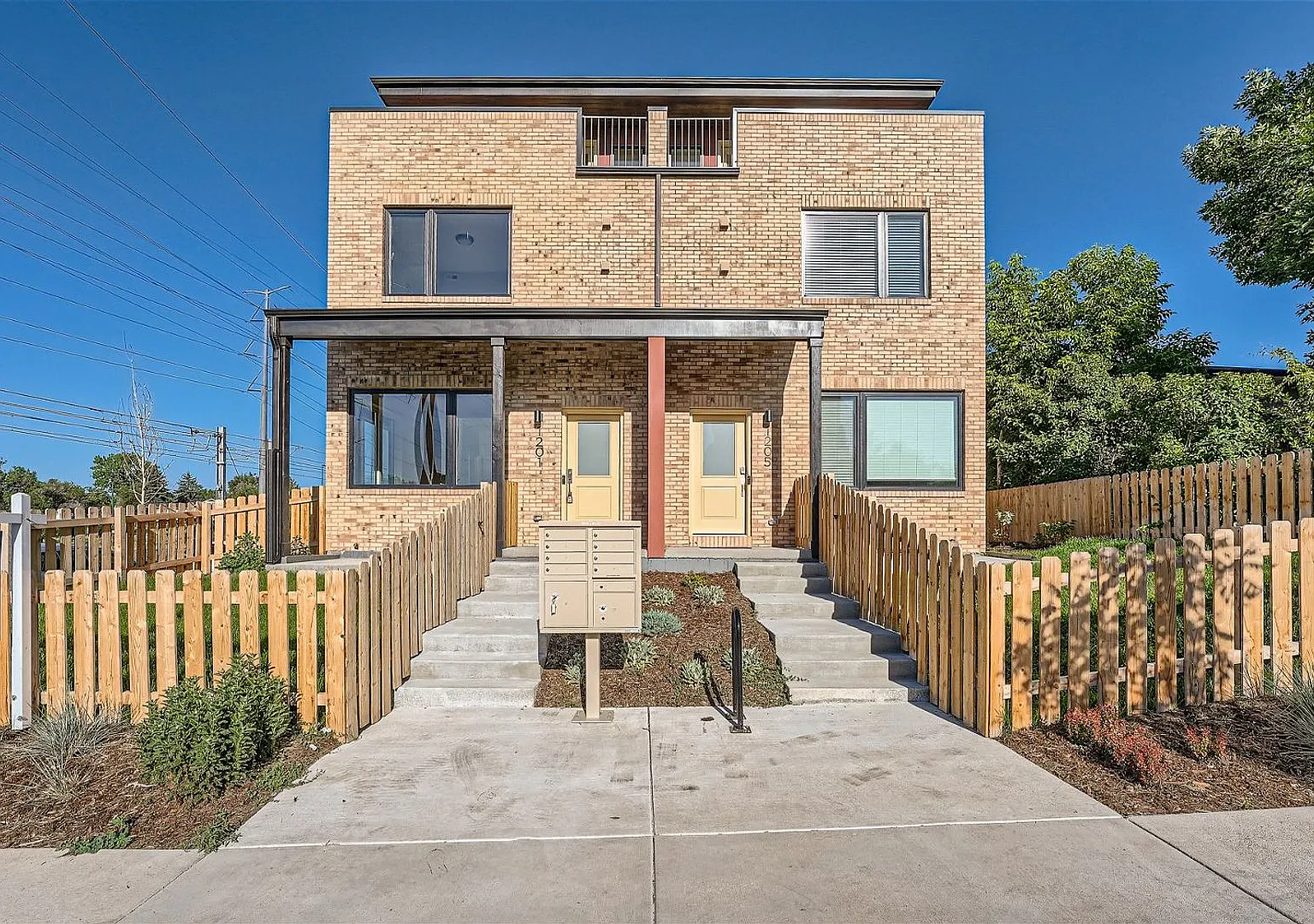 Modern 4BR Townhome Near Sloan's Lake | Rooftop Deck, Finished Basement & Garage — Photo 1