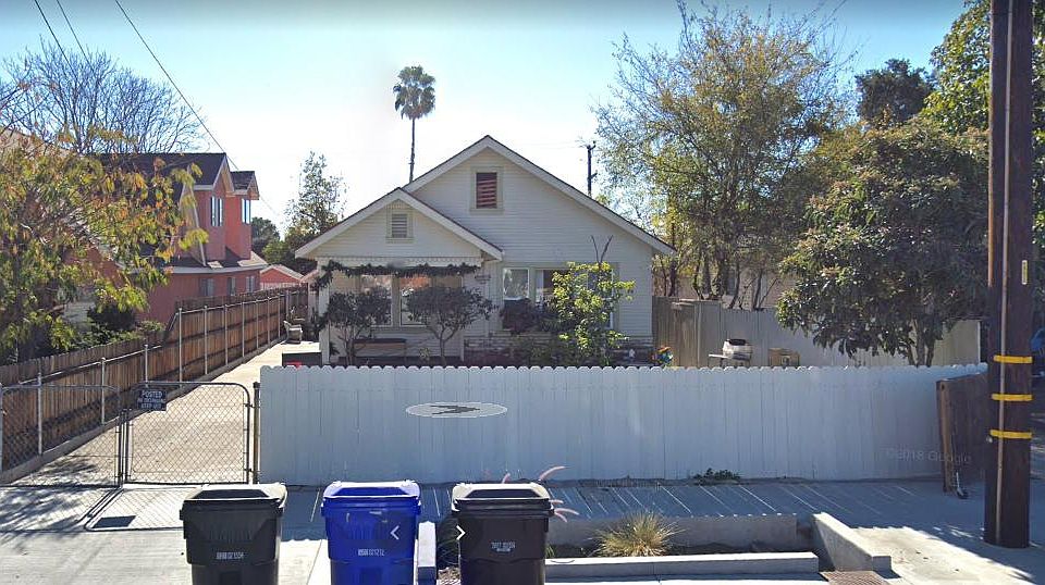 The guest house is located behind the main house. Pictured here.