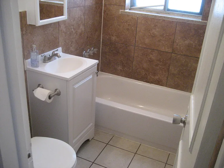 New bath with tile throughout