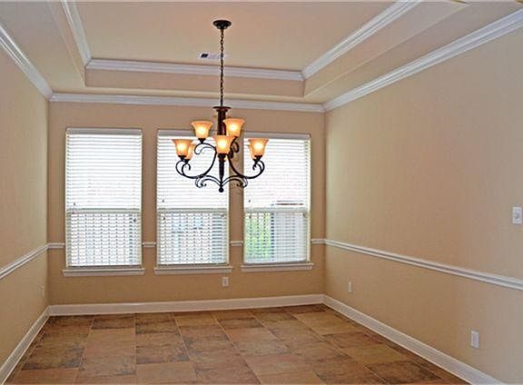  Formal dining room perfect for entertaining.