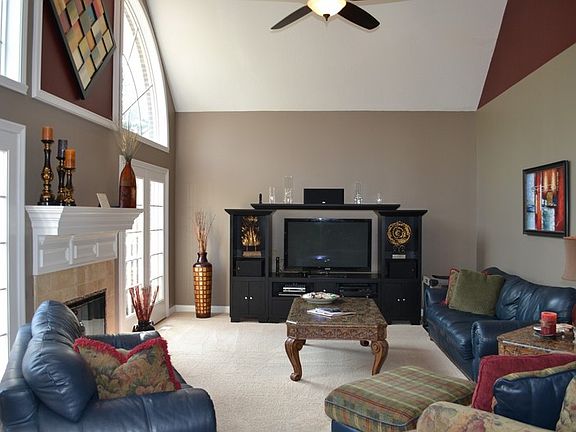 Family Room
						:
						Soaring ceilings, windows galore, gas fireplace