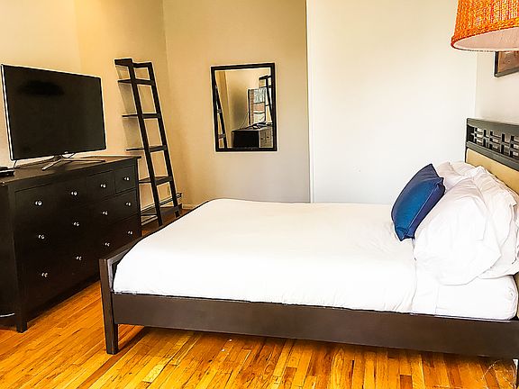2nd image of 214 E 49th St #3E