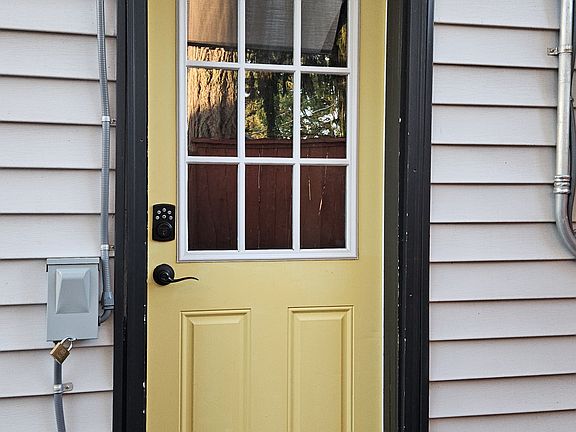 entry near parking with rain awning