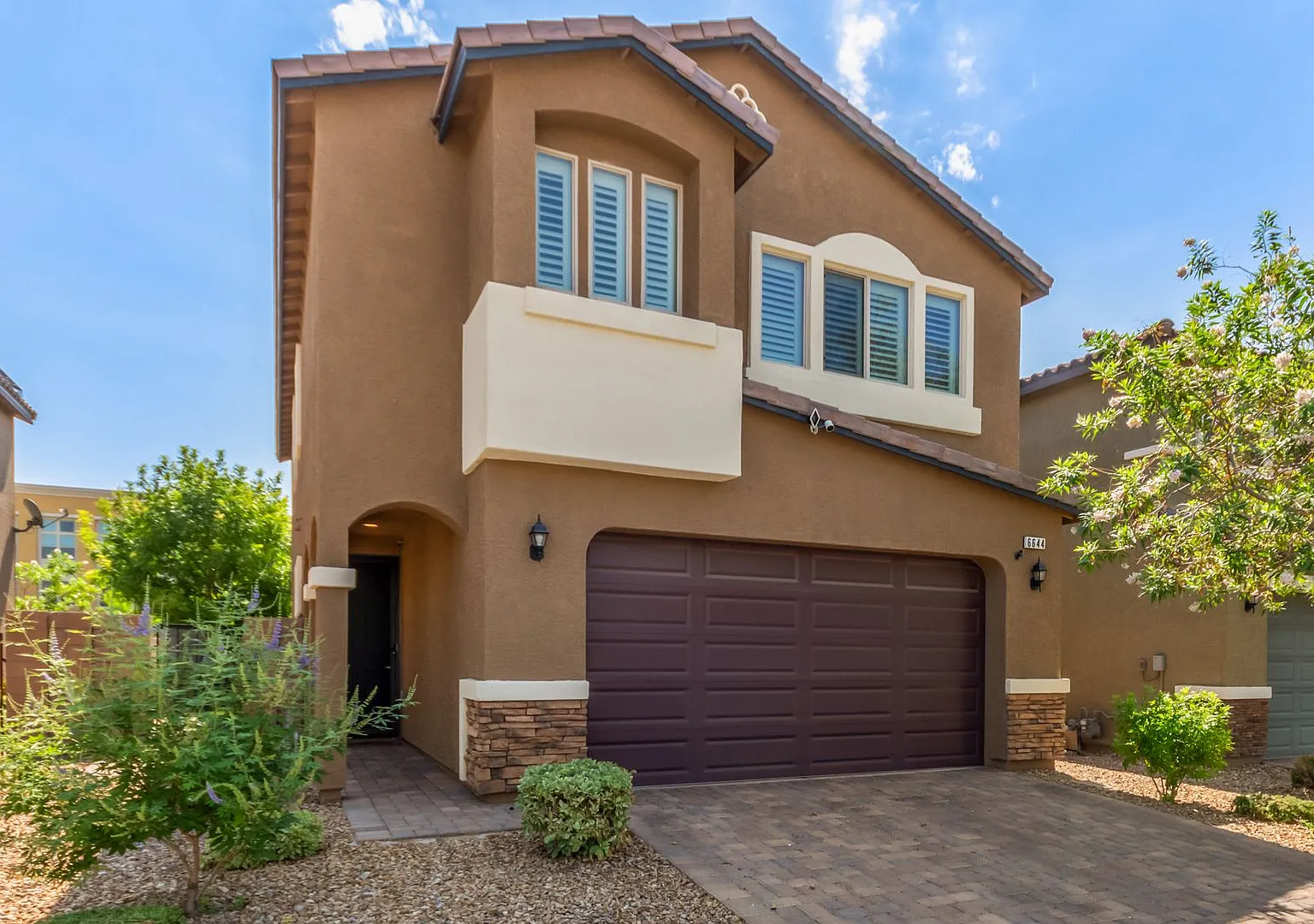 Highly upgraded gated home — Photo 3