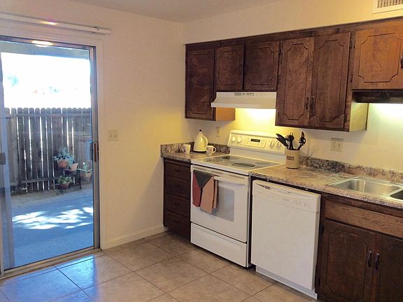 View 2 of Eat-In Kitchen has Patio Door to Large Porch Outside