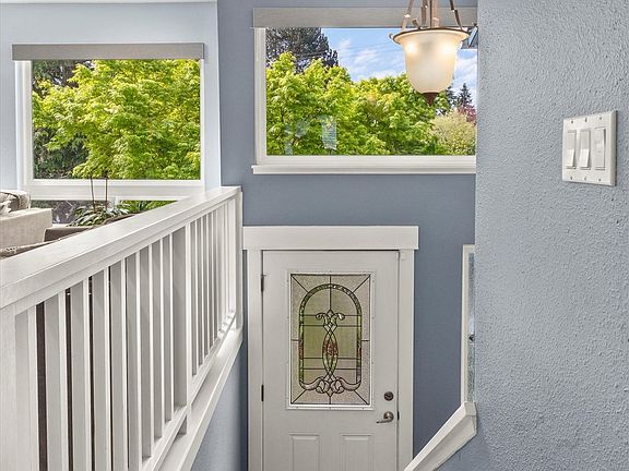 Come inside to hardwood floors, nice trim work, and bright windows.>