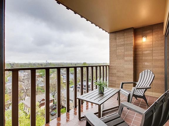Unobstructed east facing view of your Wash Park neighborhood from the unit's balcony. You can see Denver University.