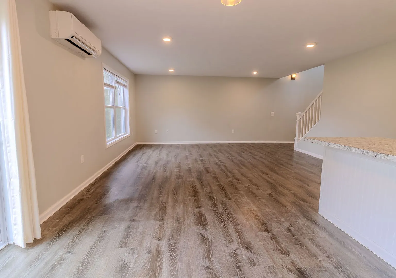 Stylish End-Unit Living | 3BR + 2.5BA — Photo 4