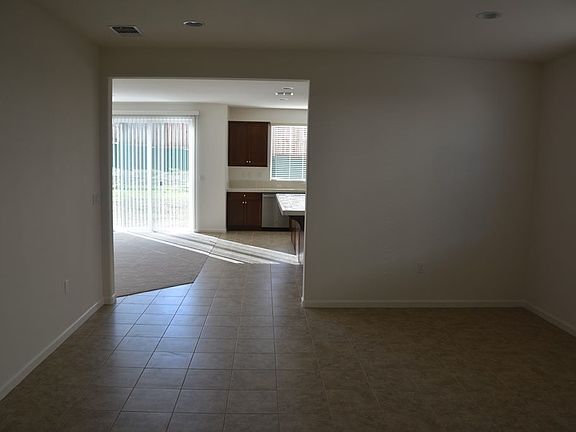Formal dining room looking into kitchen