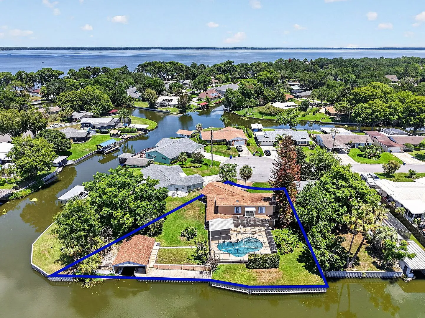 Available Now! Unique Canal-Front Pool Home with Boathouse & Chain of Lakes Access — Photo 4