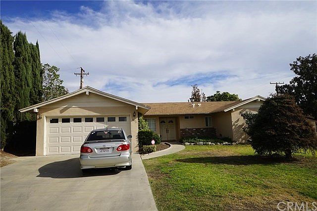 West facing - two car attached, direct entry garage.