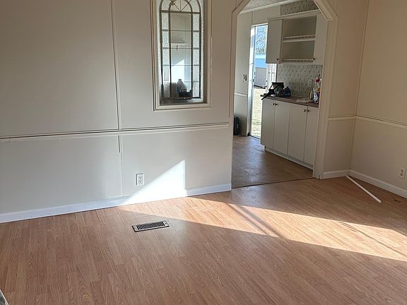 Living room looking to dinning area kitchen