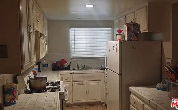 2nd image of 1239 W Rosecrans Ave APT 20
