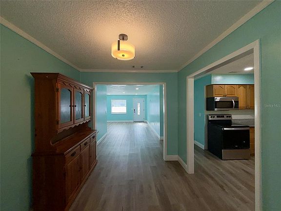 5th image of 9805 LILY STREET N #9805