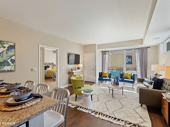 Spacious Living Area with Floor to Ceiling Windows