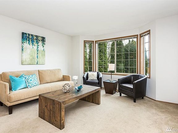 Spacious front room with large window that lets in plenty of natural light.