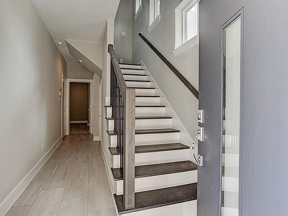 Front Door Entry leading to a bedroom with attached full-bath.  This room can be used as a second master.