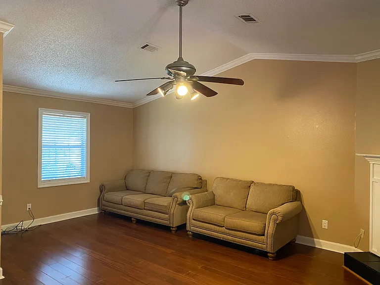 Open-concept living area with a comfortable layout and easy flow throughout the home
