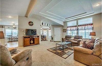 Open floor plan, vaulted ceiling, recessed lighting.