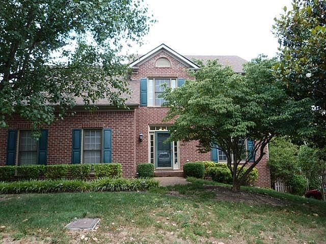 Front of house in beautiful neighborhood