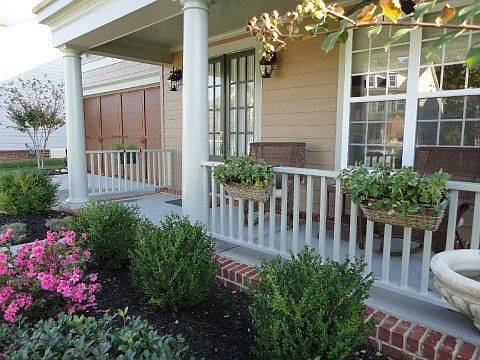 One of Two Covered Porches on front