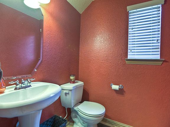 Generous Size and Conveniently Located Half Bath.