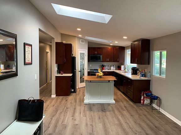 Large open concept kitchen, dining, and family room.