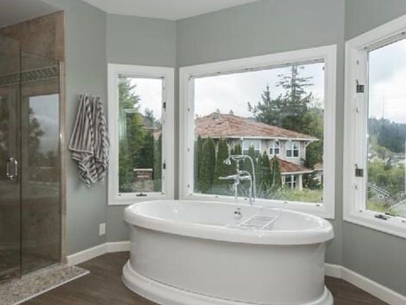 Luxury tub in master bathroom with heated floors