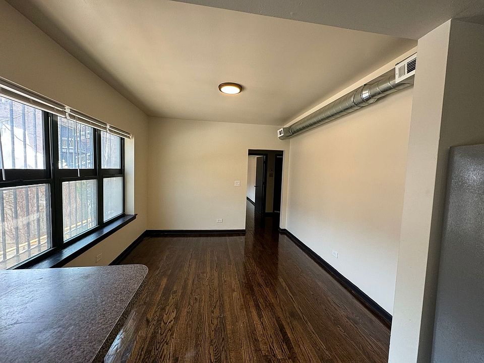 1st image of 8231 S Ingleside Ave #8233-1E