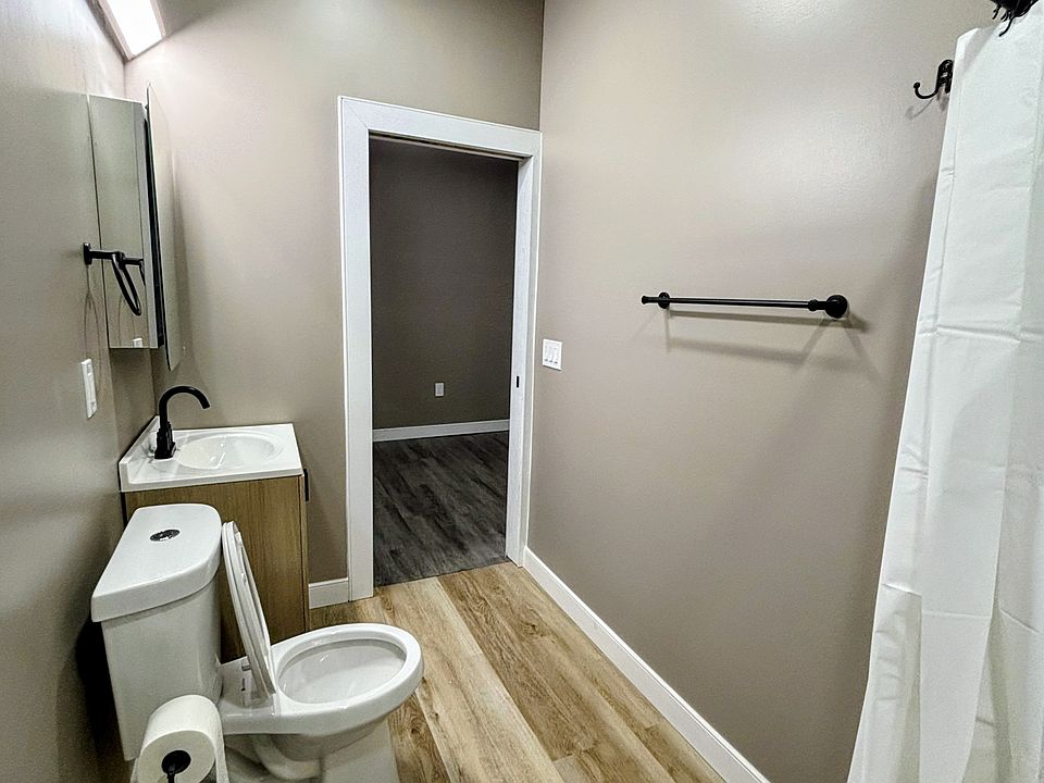 Nice size bathroom with all new fixtures 24x28 tiles in shower. Great lighting