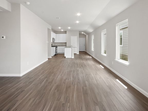 Family Room to Kitchen and Dining Area