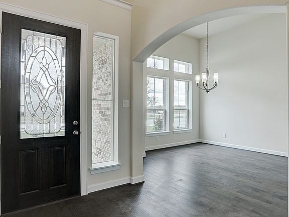 Dining room tucked off foyer