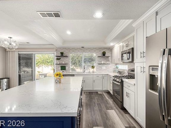 5th image of 8624 W Gilmore Ave