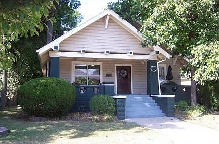 Huge Front Porch
						:
						Greet your guests on this charming front porch or just sit & read in the shade.