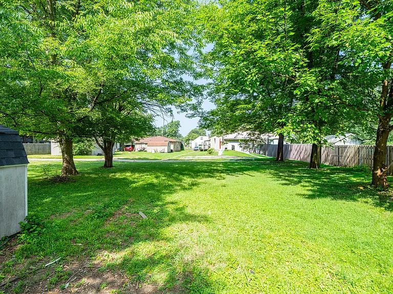 Back lawn with storage shed