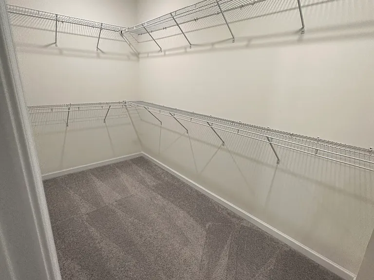 Primary with X-Large walk in closet