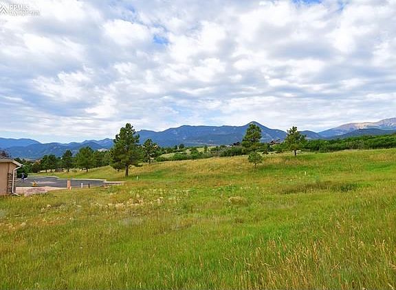 Sits at the end of a cul-de-sac with panoramic views of Pikes Peak, Cheyenne Mountain (to the south) and the Front Range.