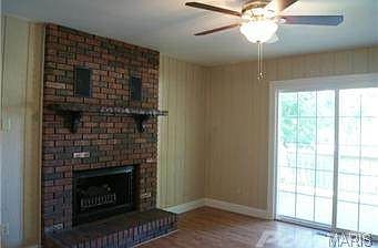 Electric Log Heater Insert in Fireplace