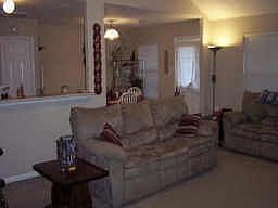 View from living area into kitchen &amp; dining area.