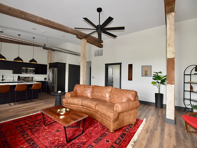 You will never feel far from anyone in this open space. Whether is cooking for family in the morning at the breakfast bar or gathering in the living room for afternoon meals, this space is sophisticated and cozy.