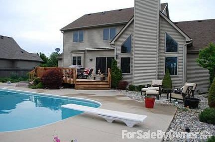 Beautiful Fenced in backyard!
						:
						This backyard is a sanctuary. in-ground pool, deck, and patio/fire pit area!!