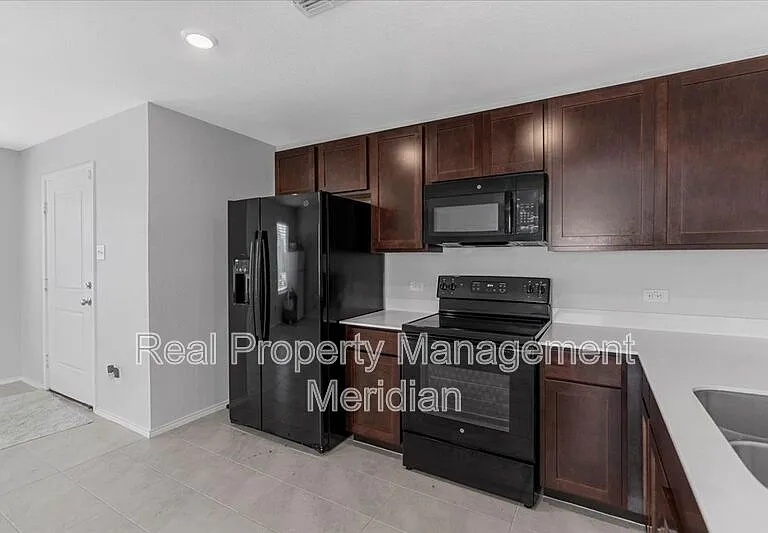 8730 Texas Risinger Dr — Photo 13