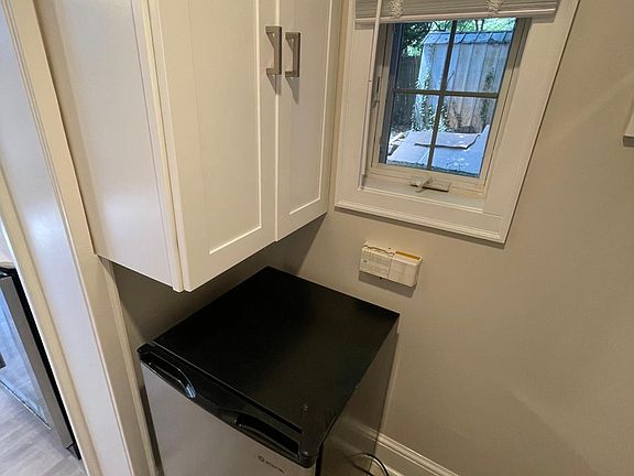 Closet with half freezer