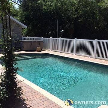 pool deck has brick pavers